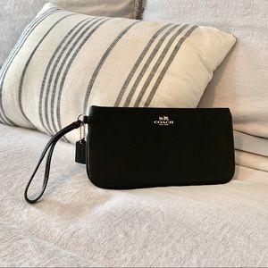 Coach clutch with wristlet